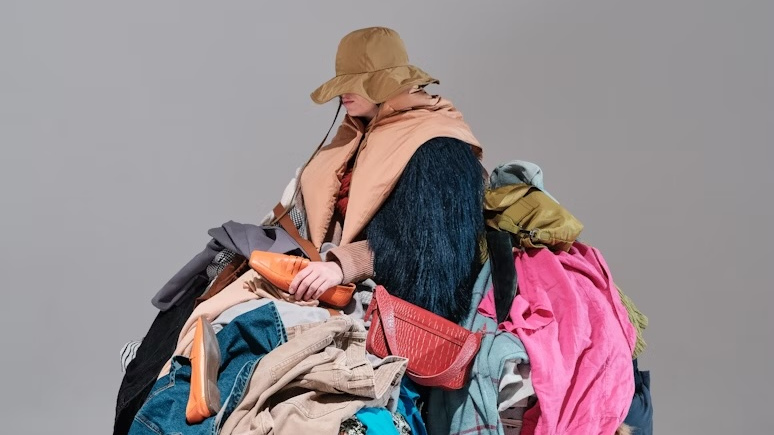 conceptual shot of Clothes overloaded model